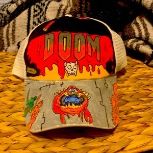 Acrylic painted hat, themed after the video game series “DOOM”.